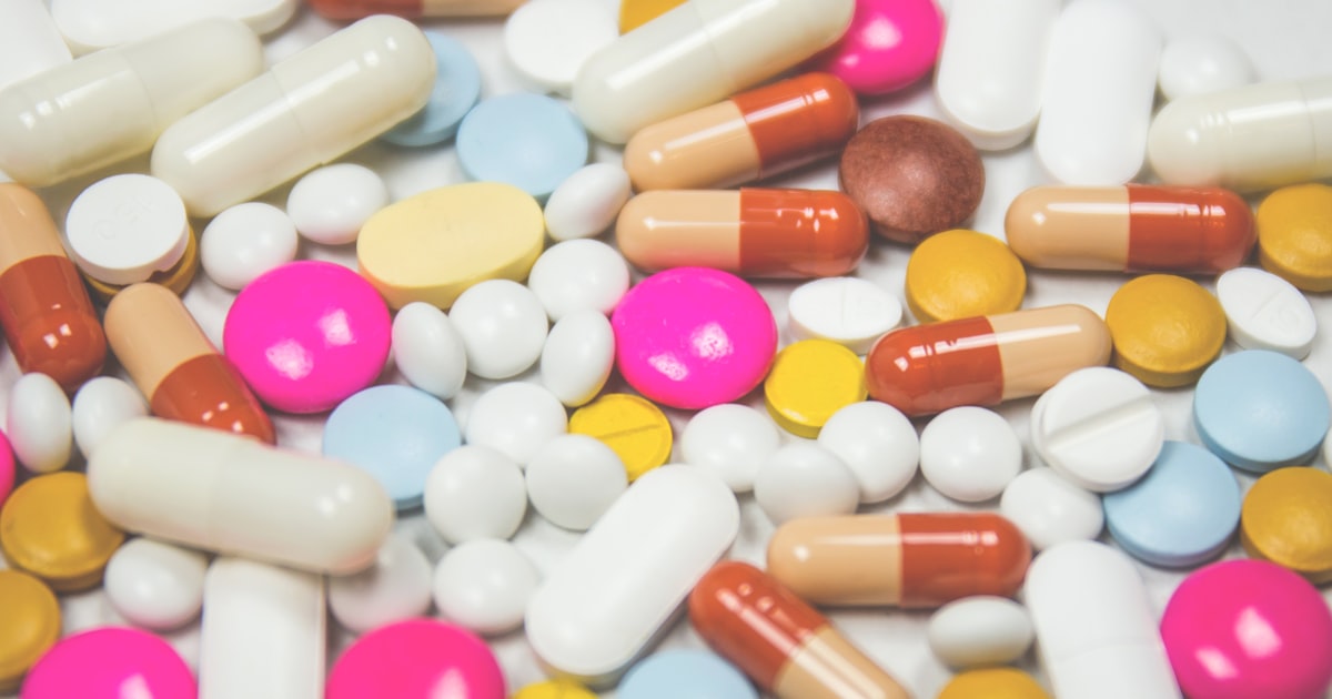 A close-up of assorted oral medication tablets and capsules, representing Rybelsus oral semaglutide — Rybelsus Coverage in Canada 2026: Provincial Plans, Private Insurance and Prior Authorization